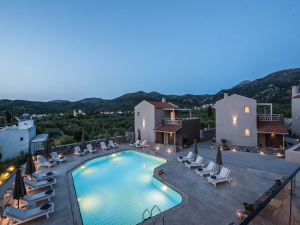 Avdou Collection swimming pool by night